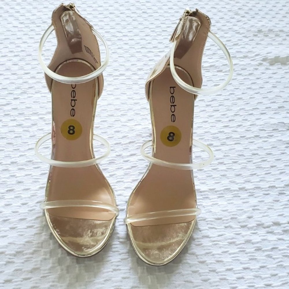 Bebe translucent and gold heels